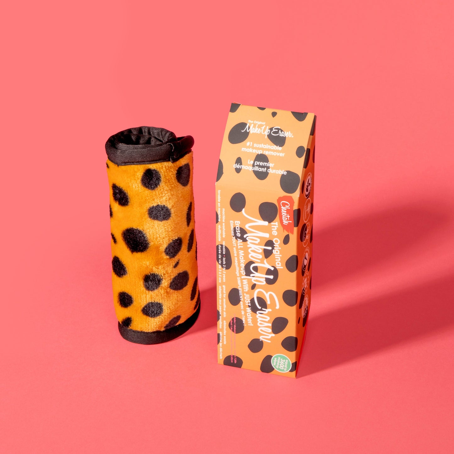 Rolled up Cheetah Print MakeUp Eraser next to packaging.