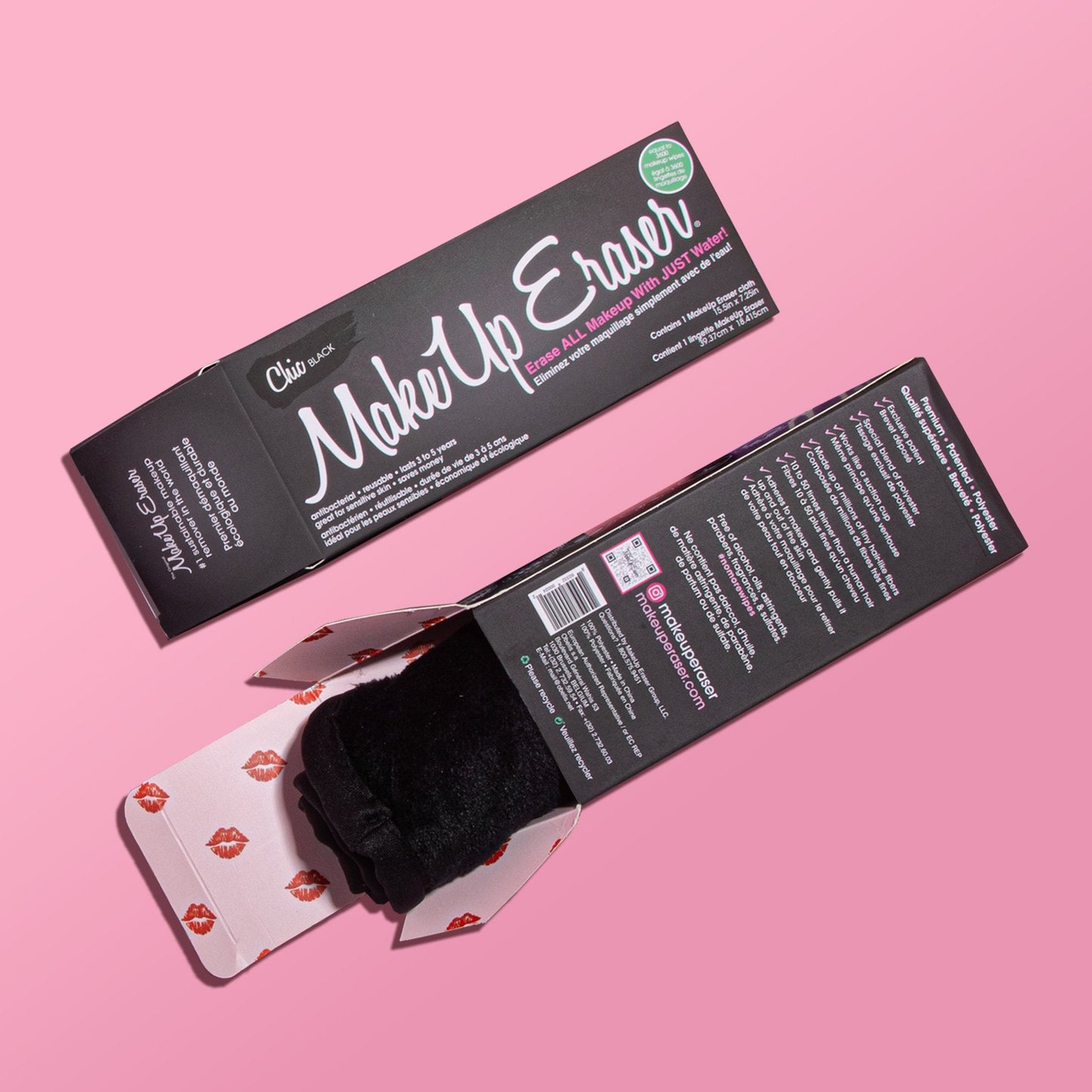 Front of Chic Black MakeUp Eraser packaging next to the back of Chic Black MakeUp Eraser packaging. The back of the packaging is open with a rolled-up Chic Black MakeUp Eraser peeking out.